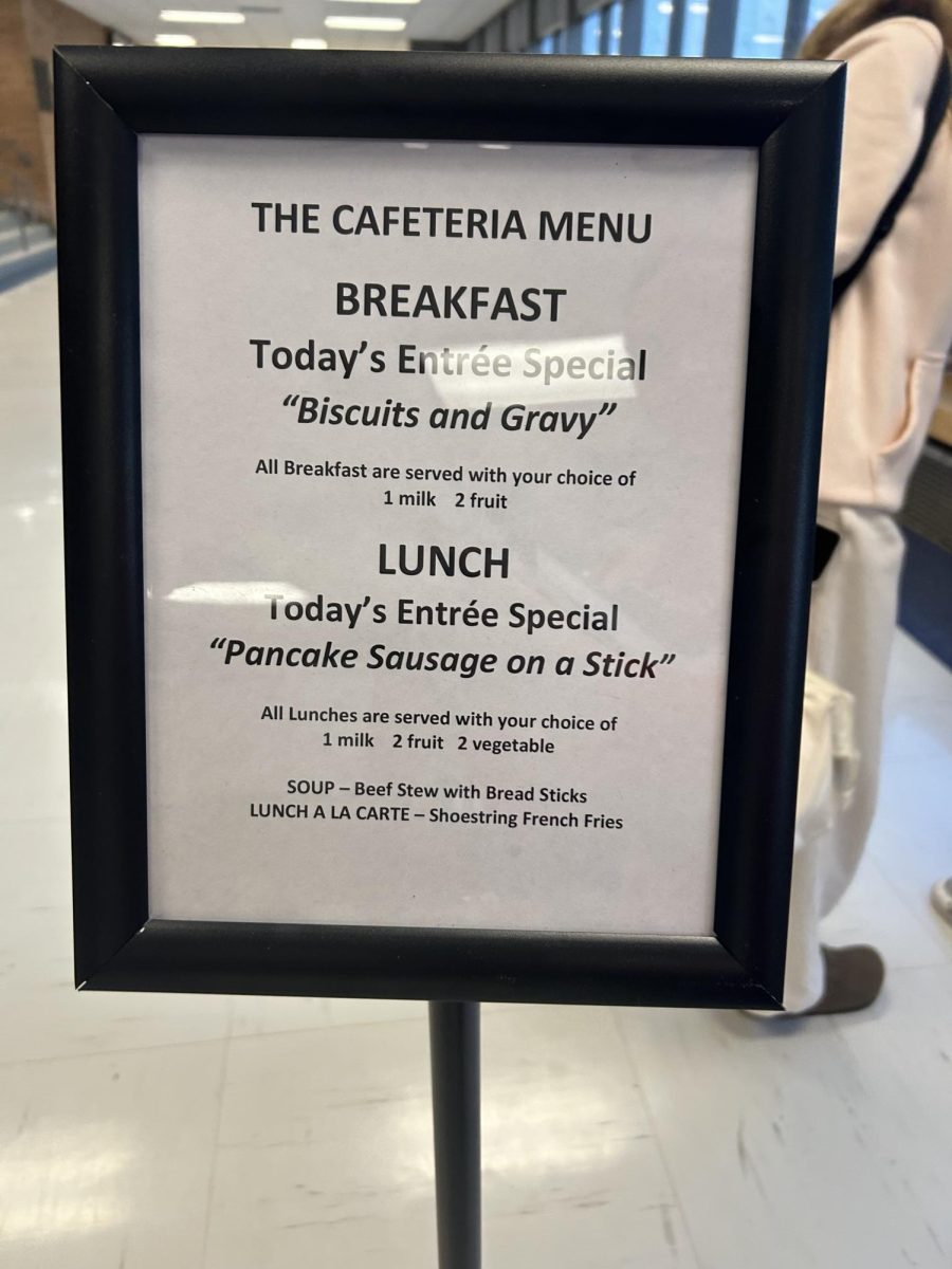 New cafeteria menu signs greet students at the entrances each morning.